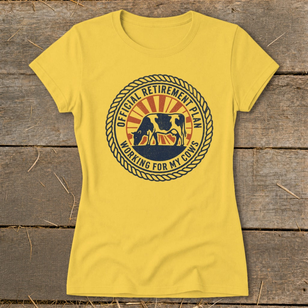 Yellow t-shirt with a circular graphic featuring a cow and text "Official Retirement Plan Working for My Cows".