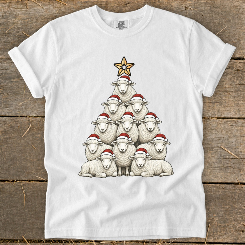 White t-shirt with a Christmas tree made of sheep wearing Santa hats, topped with a star.
