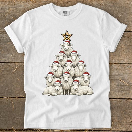 White t-shirt with a Christmas tree made of sheep wearing Santa hats, topped with a star.