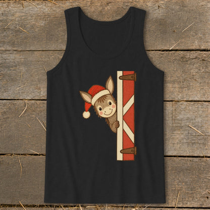 Christmas donkey peeking from behind a red and white barn door on a black tank top.