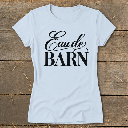 Light blue t-shirt with black text "Eau de BARN"