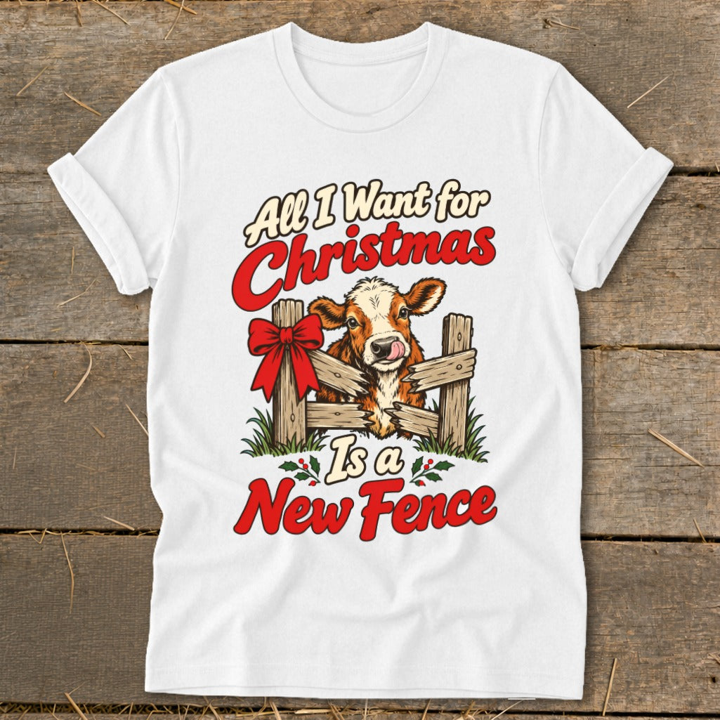 White t-shirt with graphic: "All I Want for Christmas Is a New Fence" and a cow.