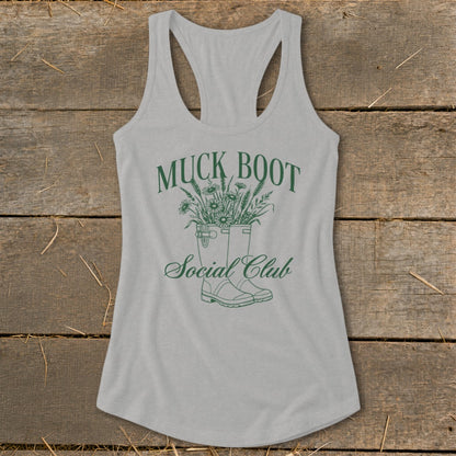 Grey tank top with green "Muck Boot Social Club" text and illustration.