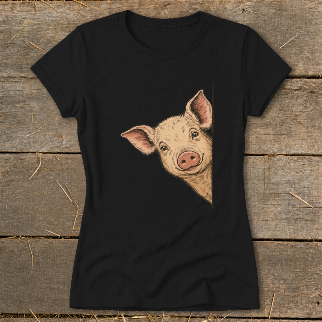 Black t-shirt with a drawing of a pig peeking from the side.