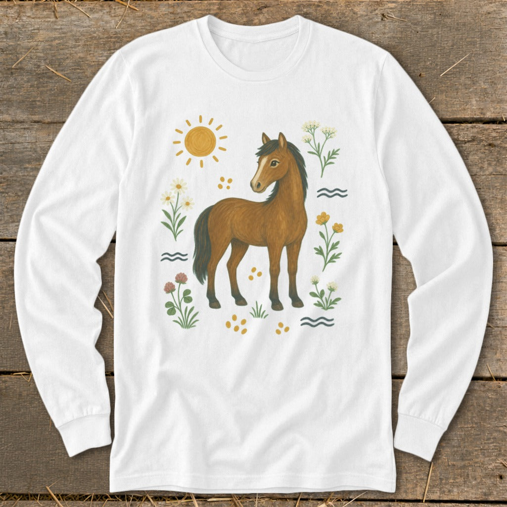 Brown horse illustration with sun, flowers, and waves on a white long-sleeve shirt.