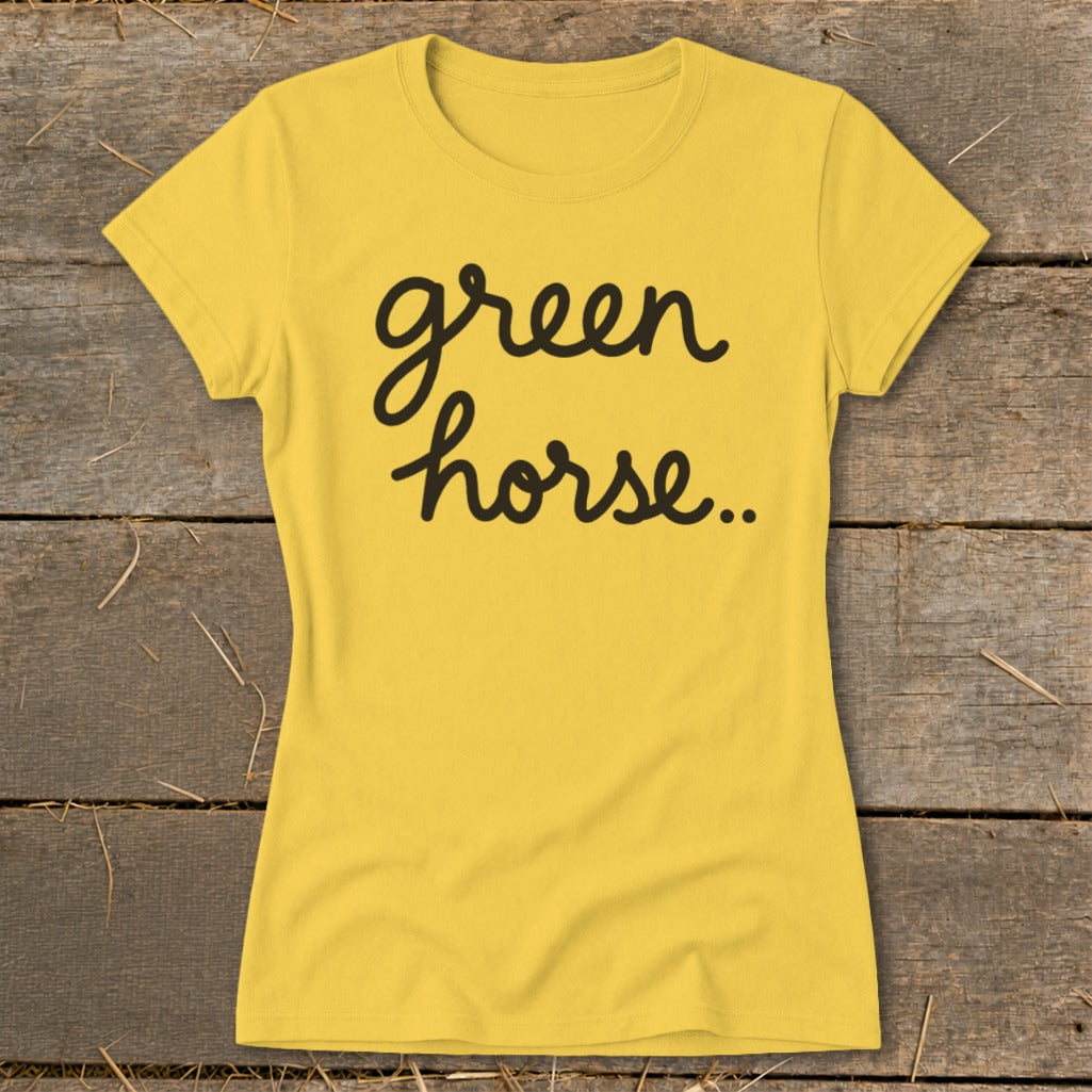 Yellow t-shirt with black script text reading "green horse..."