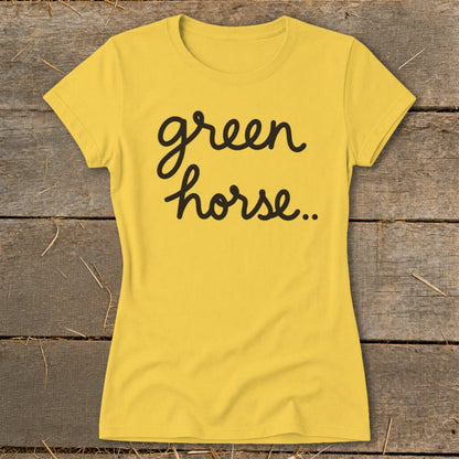Yellow t-shirt with black script text reading "green horse..."