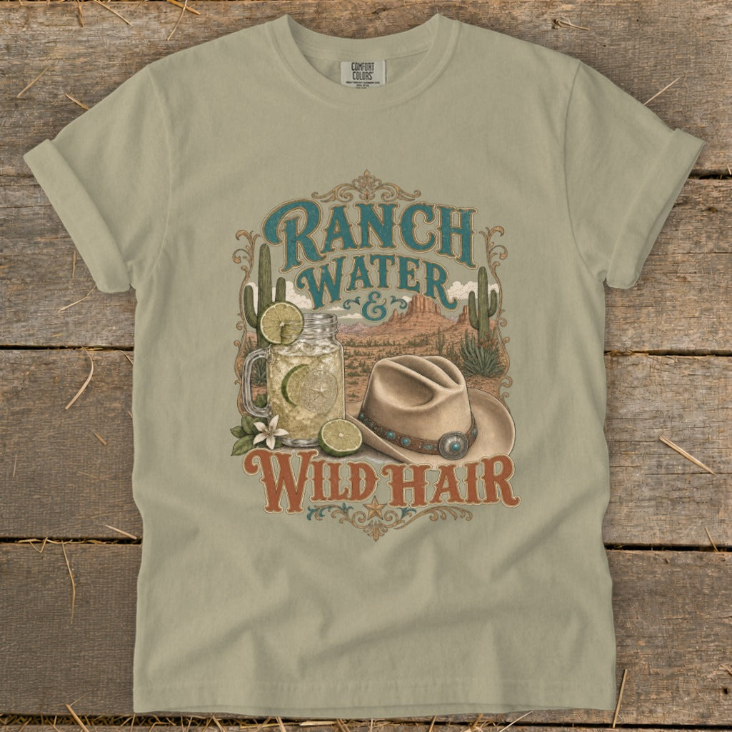 T-shirt with "Ranch Water Wild Hair" text, cactus, drink, and cowboy hat graphic.
