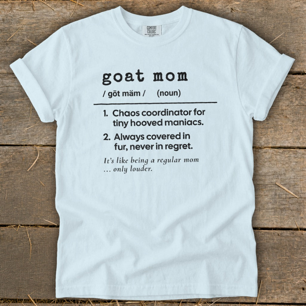 White t-shirt with "goat mom" definition and humorous text.