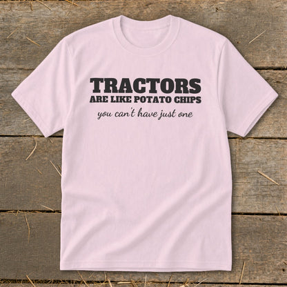 Pink t-shirt with "TRACTORS ARE LIKE POTATO CHIPS you can't have just one" text.