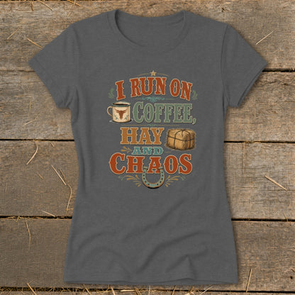 Graphic tee with text "I run on coffee, hay and chaos" and rustic icons.