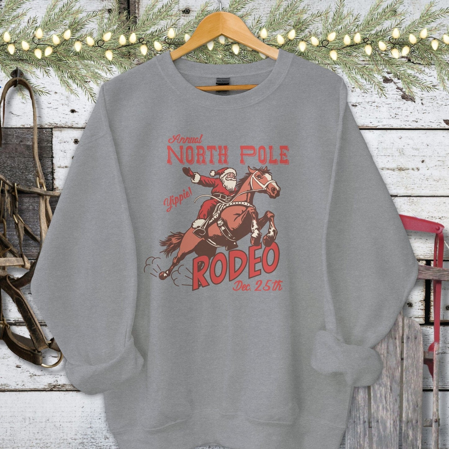 Holiday Shirt Adult Sweatshirt / Graphite Heather / S North Pole Rodeo Shirt